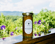 Load image into Gallery viewer, 12 oz. honeycomb style jar with our Sourwood honey.
